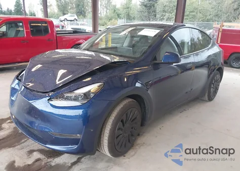 2023 Tesla Model Y Awd/Long Range Dual Motor All-Wheel Drive z USA, uszkodzony, nr VIN 7SAYGDEE2PF965905
